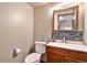 Small bathroom with updated vanity and tile backsplash at 2652 S Sable Way, Aurora, CO 80014