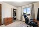 Home office with desk, chair, and closet at 2652 S Sable Way, Aurora, CO 80014