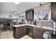 Modern kitchen with granite countertops and stainless steel appliances at 2652 S Sable Way, Aurora, CO 80014