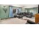 Comfortable living room with sectional sofa and a view to the backyard at 2652 S Sable Way, Aurora, CO 80014