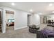 Finished basement provides additional living space with cozy seating and convenient amenities at 3145 W Farmdale Rd, Englewood, CO 80110