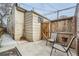 Private backyard patio area with wood fencing and space for outdoor seating at 710 E Alameda Ave, Denver, CO 80209