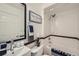 Bright bathroom with subway tile, modern fixtures, and a clean aesthetic at 710 E Alameda Ave, Denver, CO 80209