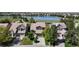 Aerial view showcasing a charming home near a tranquil lake, playground and beautiful neighborhood at 9255 Melborne Ct, Parker, CO 80134
