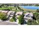 Aerial view of neighborhood homes near park and lake at 9255 Melborne Ct, Parker, CO 80134