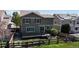 Home with backyard, deck, garden beds and fencing at 9255 Melborne Ct, Parker, CO 80134