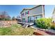 Backyard with deck, garden beds and lawn at 9255 Melborne Ct, Parker, CO 80134