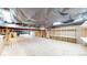 Unfinished basement with visible beams and utilities offering potential for customization at 9255 Melborne Ct, Parker, CO 80134