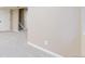 View of finished basement with gray carpet leading to stairs at 9255 Melborne Ct, Parker, CO 80134