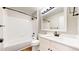 Bathroom featuring bathtub/shower combo with white tiles, and single vanity at 9255 Melborne Ct, Parker, CO 80134