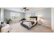 Relaxing bedroom with a ceiling fan and a cozy seating area by a window, ideal for unwinding at 9255 Melborne Ct, Parker, CO 80134