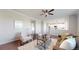 Comfortable living room with hardwood floors offering a view into the kitchen at 9255 Melborne Ct, Parker, CO 80134