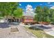Backyard featuring a patio with outdoor seating, a garden bed, and lush greenery at 9880 E 157Th Ave, Brighton, CO 80602