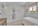 Bedroom with carpet, closet, window, and neutral tones at 9880 E 157Th Ave, Brighton, CO 80602