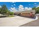 Charming ranch home featuring a well-maintained front yard and an attached two-car garage at 9880 E 157Th Ave, Brighton, CO 80602