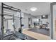Spacious home gym featuring weight lifting equipment, stationary bike and workout space at 9880 E 157Th Ave, Brighton, CO 80602