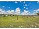 This spacious property features an expansive grassy field with plenty of room to roam and explore at 9880 E 157Th Ave, Brighton, CO 80602