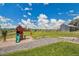This spacious property has a playground set with slide and swings in the large backyard at 9880 E 157Th Ave, Brighton, CO 80602