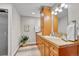 Bathroom featuring a vanity with cabinets and drawers, an oval sink, and a walk-in shower at 5255 Ridge Trl, Littleton, CO 80123