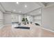 Home gym with wood floor, barre, mirrors, and space for yoga at 5255 Ridge Trl, Littleton, CO 80123