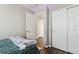 Bedroom features a large closet, LED lighting, and gray decor at 19560 E 18Th Pl, Aurora, CO 80011