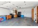 Spacious garage featuring ample storage space and a functional kitchenette at 19560 E 18Th Pl, Aurora, CO 80011