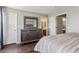 Spacious main bedroom with attached bath and open plan design at 19560 E 18Th Pl, Aurora, CO 80011