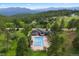 A beautiful swimming pool at the community center with a mountain view in the background at 2164 Foothills S Dr, Golden, CO 80401