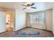 Spacious bedroom with ceiling fan and window at 4508 E Louisiana Ave, Denver, CO 80246