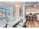 Modern dining room with hardwood floors and a view of living room at 4508 E Louisiana Ave, Denver, CO 80246