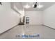 Spacious two-car garage with extra storage shelving at 4508 E Louisiana Ave, Denver, CO 80246