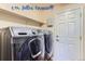 Laundry room with stacked washer and dryer at 4508 E Louisiana Ave, Denver, CO 80246