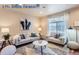 Relaxing living room with a neutral color scheme and ample seating at 4508 E Louisiana Ave, Denver, CO 80246