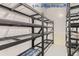 Garage storage room with wire shelving for ample storage at 4508 E Louisiana Ave, Denver, CO 80246