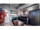 Eclectic bedroom with unique décor and a comfortable daybed, creating a personalized space at 7865 E Mississippi Ave # 702, Denver, CO 80247
