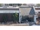 Image of the clubhouse/office with well-maintained landscaping at 7865 E Mississippi Ave # 702, Denver, CO 80247