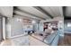 Comfortable living room with a large sectional sofa, flat-screen TV, and modern decor at 7865 E Mississippi Ave # 702, Denver, CO 80247