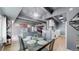 Open-concept living space showcasing the dining area, living room, and kitchen with modern finishes at 7865 E Mississippi Ave # 702, Denver, CO 80247