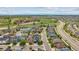 Residential neighborhood aerial shot featuring manicured lawns, mature landscaping, and convenient road access at 5021 S Rome St, Aurora, CO 80015