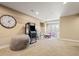 Charming game room with fun arcade, bean bag, cute decor, and striped walls at 5128 Longs Peak St, Brighton, CO 80601