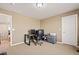 Bright home office with a desk, comfortable chair, and storage options makes a perfect workspace at 5128 Longs Peak St, Brighton, CO 80601
