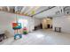 Unfinished basement area offers potential for customization and ample storage space, with a window for natural light at 3062 Grizzly Peak Dr, Broomfield, CO 80023