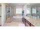 Spacious bathroom featuring a dual vanity, a shower, and a large soaking tub at 3062 Grizzly Peak Dr, Broomfield, CO 80023
