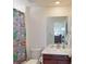 Bright bathroom featuring a marble countertop, modern sink and a Minecraft-themed shower curtain at 3062 Grizzly Peak Dr, Broomfield, CO 80023