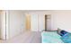 Bright bedroom featuring a daybed with closet, carpet and neutral wall paint at 3062 Grizzly Peak Dr, Broomfield, CO 80023