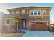 Well-maintained two-story home with a two car garage and appealing curb appeal at 3062 Grizzly Peak Dr, Broomfield, CO 80023