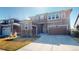 Charming two-story home with a two car garage and appealing exterior at 3062 Grizzly Peak Dr, Broomfield, CO 80023