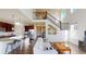 Open floor plan with kitchen, living area, and second floor view at 3062 Grizzly Peak Dr, Broomfield, CO 80023