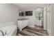 Bathroom featuring a soaking tub, modern fixtures, and updated countertops at 6405 Eagle Feather Trl, Littleton, CO 80125