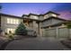 Beautiful home with three-car garage and well-maintained landscaping in a serene location at 6405 Eagle Feather Trl, Littleton, CO 80125